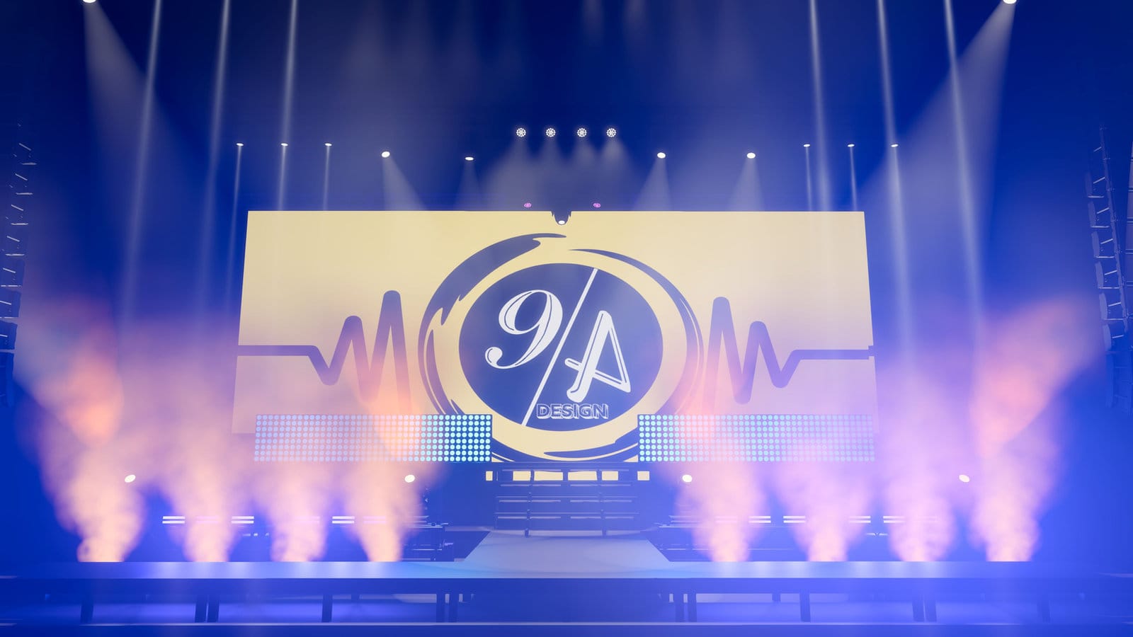A stage set and lit inside a venue