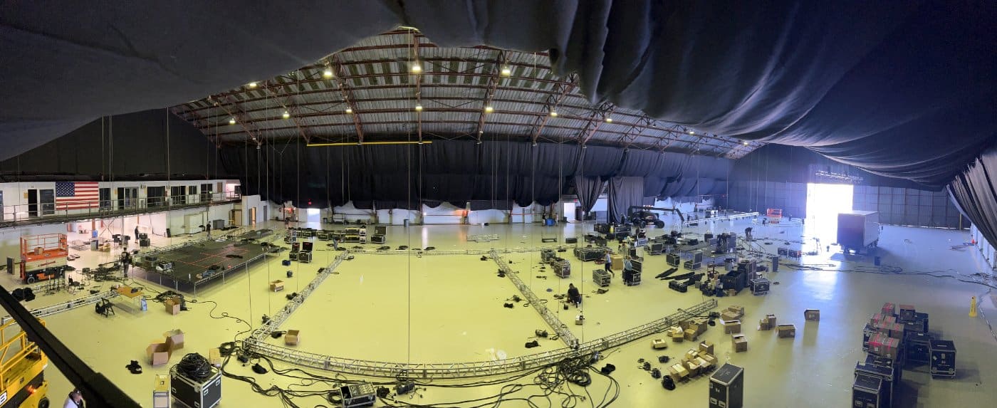 Exhibition hall — truss and lighting overhead, October 2022